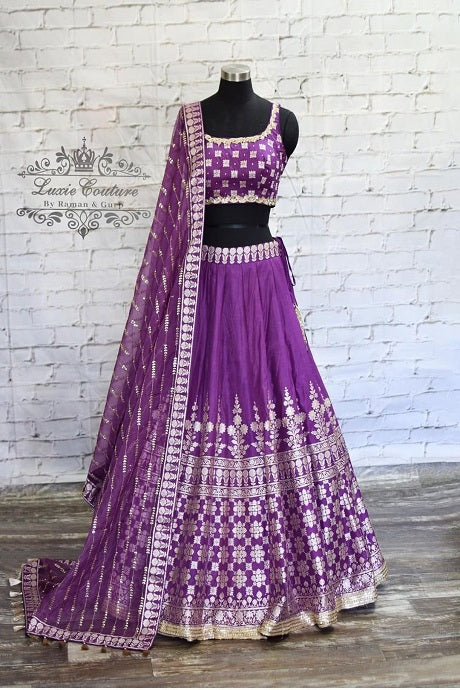 Sabyasachi purple sale lehenga