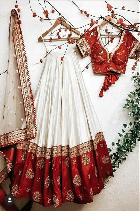 Off white organza lehenga set with red bandhani dupatta only on Kalki |  Bandhani dress, Indian bridal outfits, Designer bridal lehenga