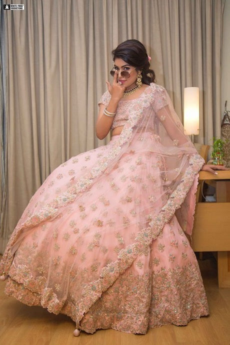 Buy Glamorous Dusty Pink Sequins Work Net Reception Wear Lehenga Choli At  Zeel Clothing